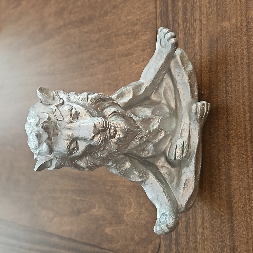 Lion yoga pose statue